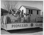 Float Carrying Humble Oil & Refining Company Pioneers Club Members