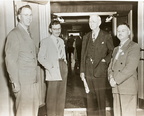 Dr. John Schilling and Dr. L. W. Raney with radio announcer Bob Nolan