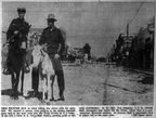 H. E. McKee and Q. H. Alexander pictured in front of Texas Avenue, 1947